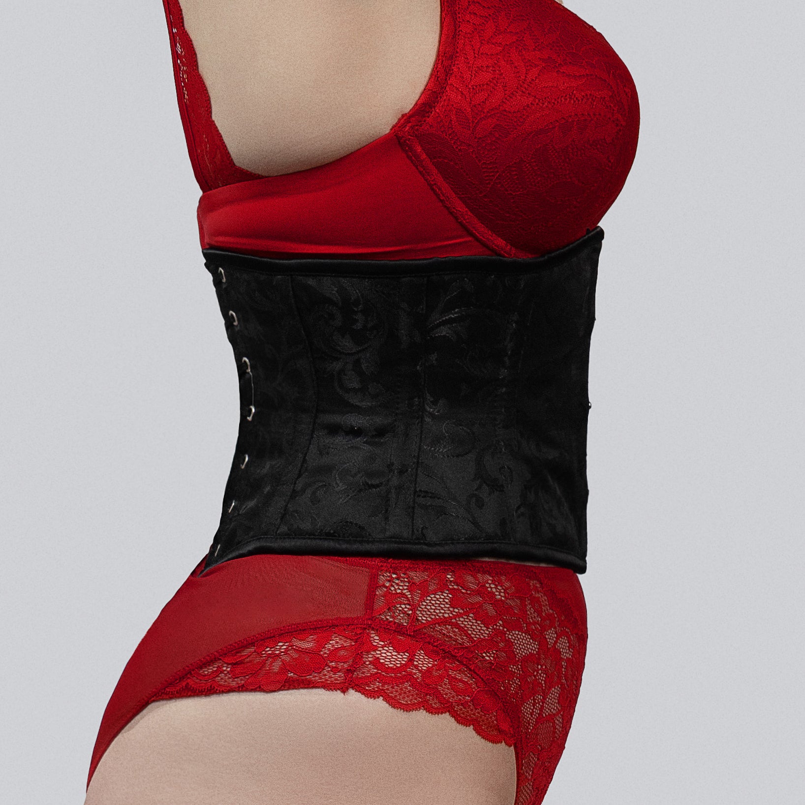 trixie black brocade waspie corset side view lace up back silver eyelets corsets island